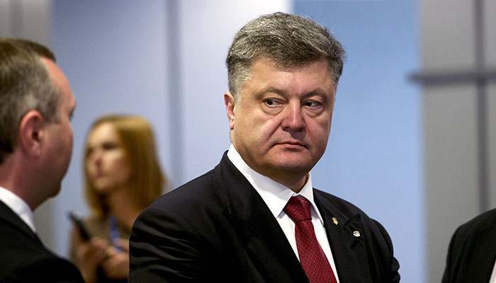 Год на пороховой бочке. «Топ-10» невыполненных обещаний Порошенко - Немецкая версия