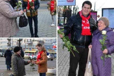 Олег Лебедев и молодые коммунисты на улицах Тулы в канун праздника дарили женщинам цветы