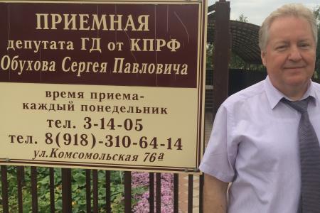 Встречи в Динском районе Кубани. Депутат С.П.Обухов отчитался о работе по социальной защите граждан и наградил ветеранов