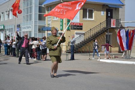 Астраханские коммунисты приняли участие в праздничном шествии, посвященном Дню Победы